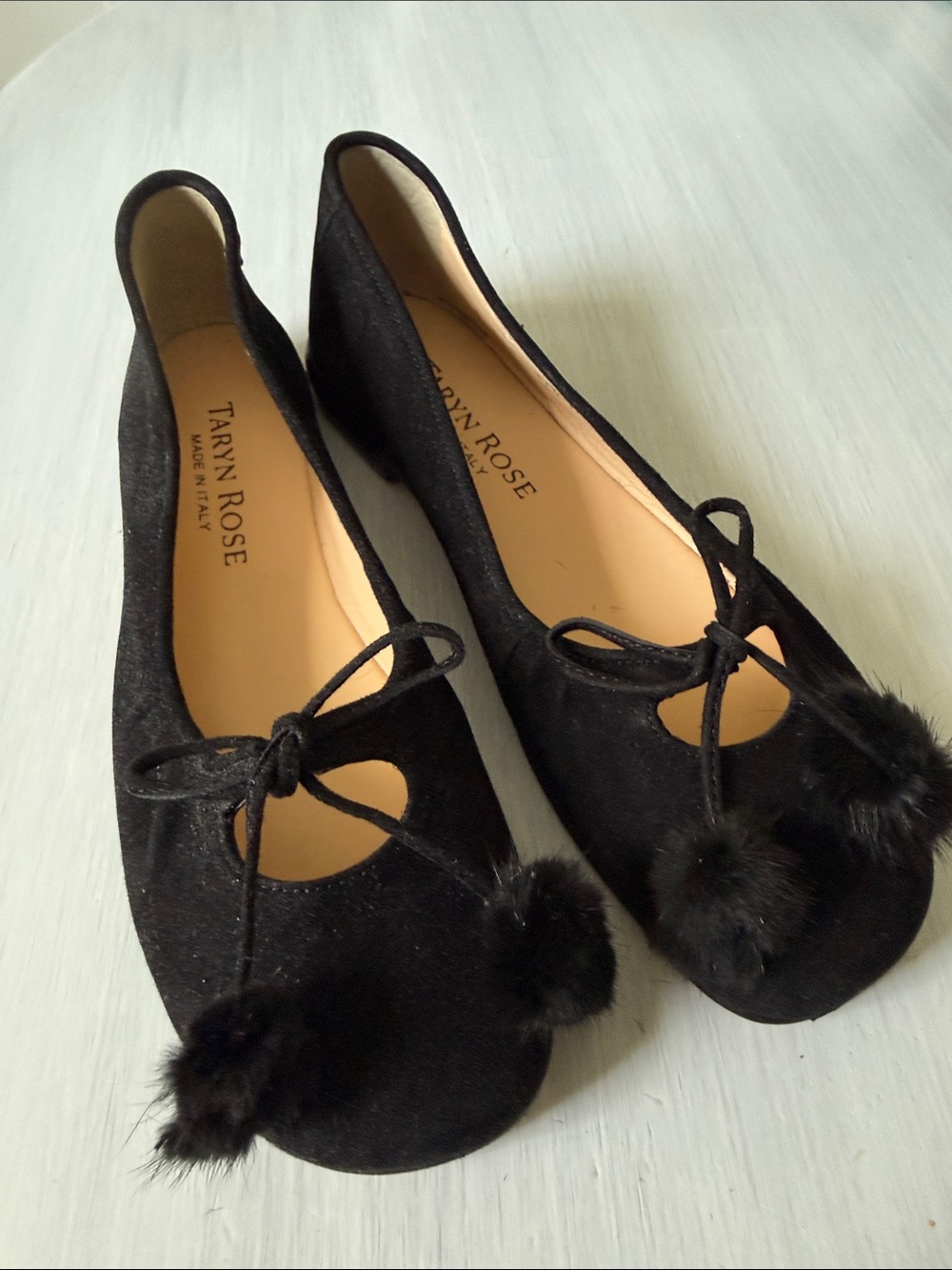 Taryn Rose Black Suede Pom-Pom Ballet Flats